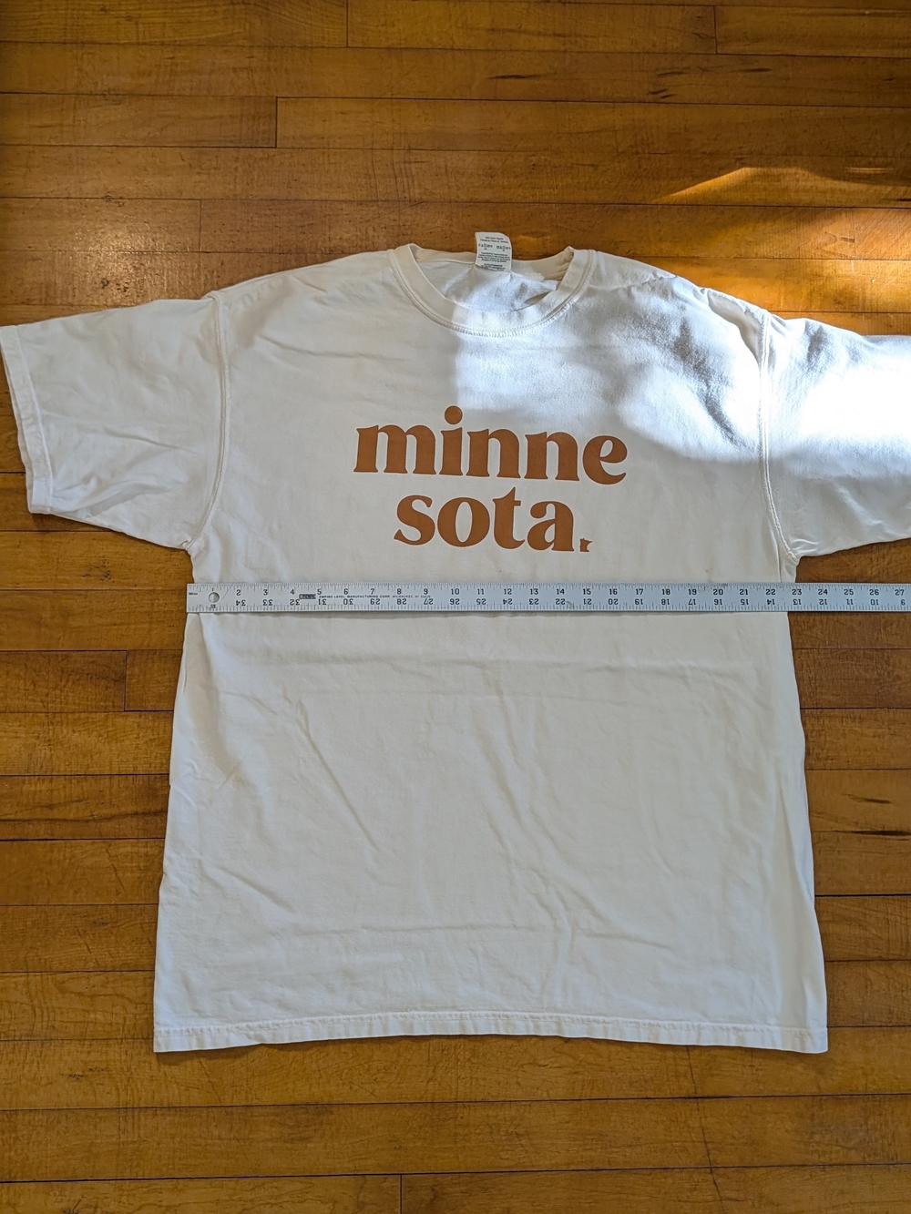 "Minnesota" Comfort Colors White T-Shirt with Brown "minne sota." Graphic